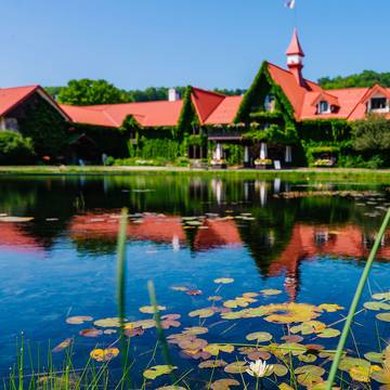 The Highlands front pond with the Main Lodge in the background
