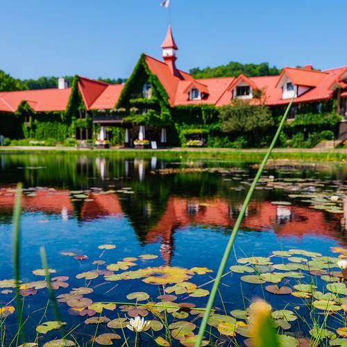 The Highlands front pond with the Main Lodge in the background