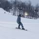 A snowboarder at The Highlands