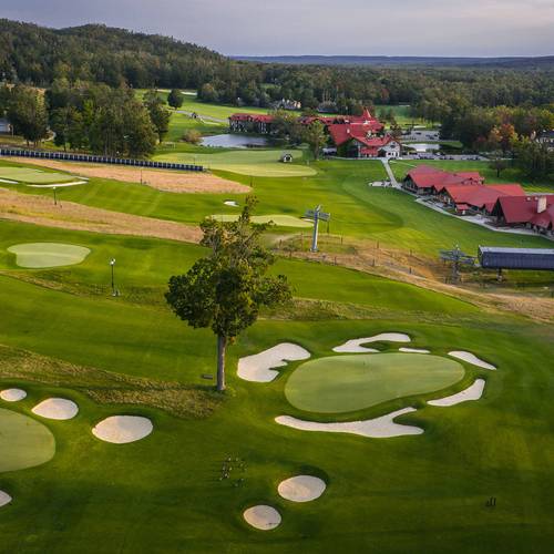 Drone shot of Doon Brae during sunsire on Holes 2-4