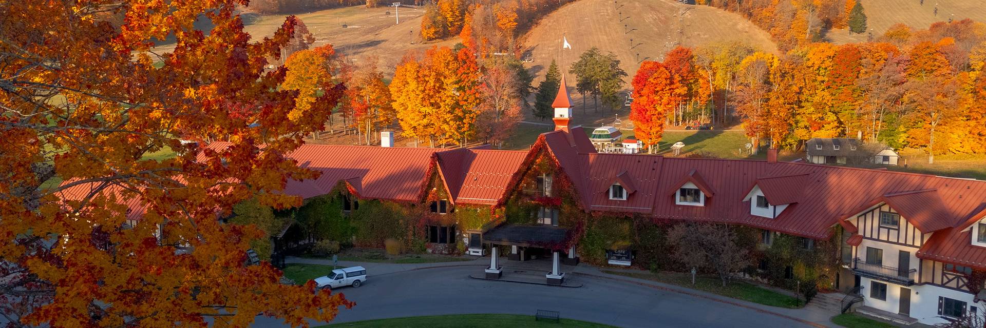 Drone shot of the Main Lodge exterior during fall