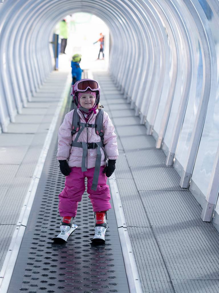 A child in ski gear on Renates Express