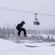 A snowboarder on the Funland Terrain Park at The Highlands