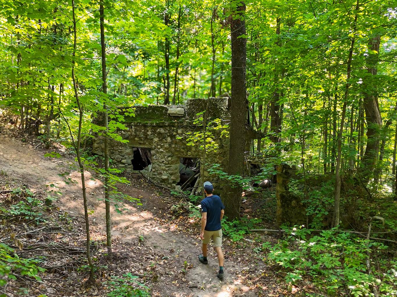 A man hiking on a trail at The Highlands