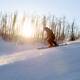 A skier during sunset at The Highlands